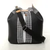 Sac seau Coton d'Avril Angèle Cuir Noir grainé et tissu